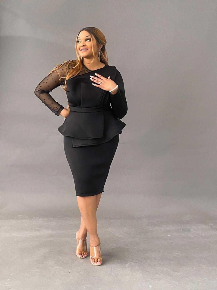 Gorgeous modest black dress for every woman. Knee length, one mesh sleeve with polka dots, beautiful bow style in the front, perfect for any and every occasion. Order yours now. oh, it comes in white too!