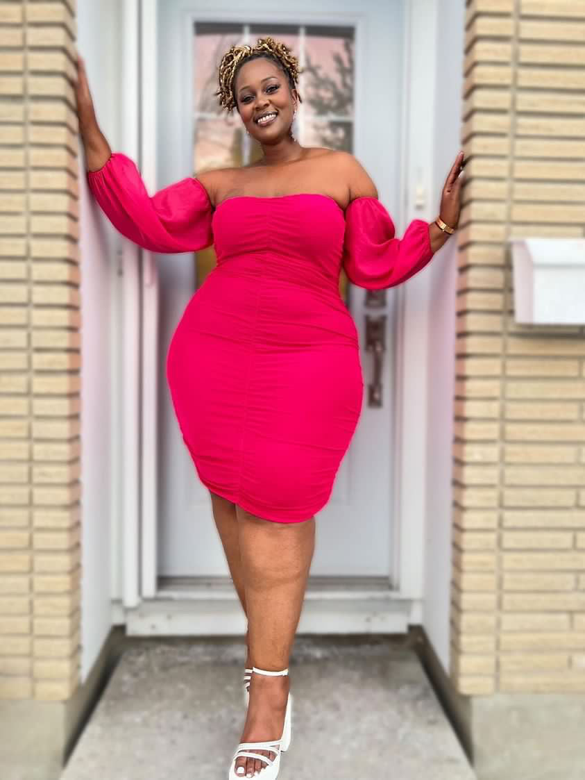 Gorgeous off shoulder dress for plus size women. Beautiful bright pink color with lovely puff sleeves. The perfect look for any event if you want to show out.